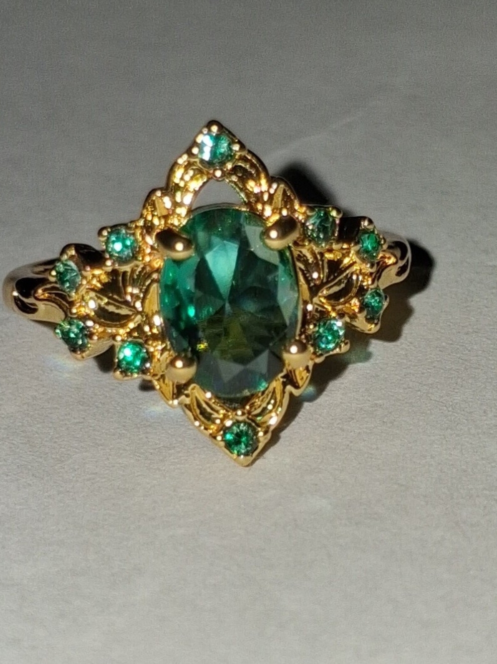 Yellow Gold Teal Topaz Ring